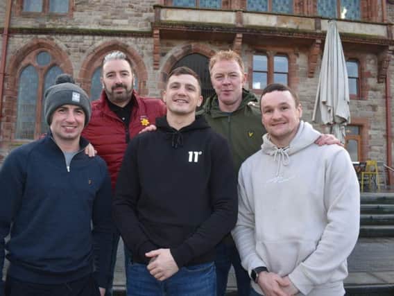 DERRY BID . . . Back row, left to right, Seamus Cunning Derry Boxing Promotions, Cahir Duffy (St Joseph's ABC), front row, Tyrone McCullagh, Connor Coyle and Sean McGlinchey, throw their weight behind the bid to bring professional boxing back to Derry for the first time since 1982.