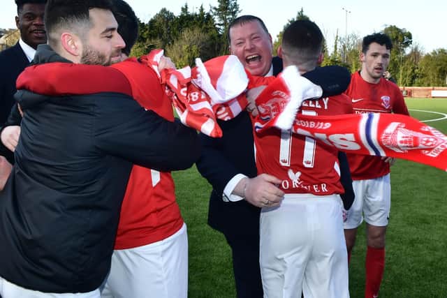 Striker, Davy McDaid celebrates with his teammates after the final whistle on Saturday.