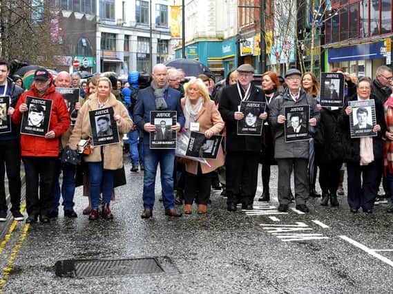 Bloody Sunday families and relatives make their way to the City Hotel for a press conference yesterday.  DER1119GS-032