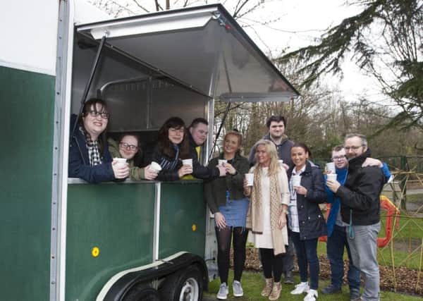 TEA IN THE PARK  -  Group pictured on Friday morning at the Playtrails new Tea in the Park initiative - joint winner of the £2k Social Enterprise Competition. run by Derry City and Strabane District Council as part of Enterprise Week 2019. The Playtrails £1k prize will go towards retrofitting this traditional Horsebox with tea and coffee-making facilities which will provide customer service training for a group of 15-20 young people with disabilities who will serve refreshments to visitors at the Belmont site. Included with some of the young people at the site are Jenny Marshall, Project Co-Ordinator, Anne Marie Donnelly, Transition Services Manager, Liberty Consortium, Ciara Donnelly Jack, Technical Support Officer and Mark Roberts, Director, Liberty Consortium.