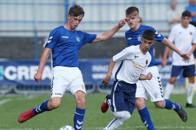 Rangers' Cole McKibbon    and Co Londonderry Lee Harkin