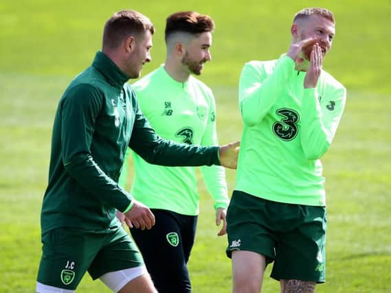 James Collins, Sean Maguire and James McClean during training this week.