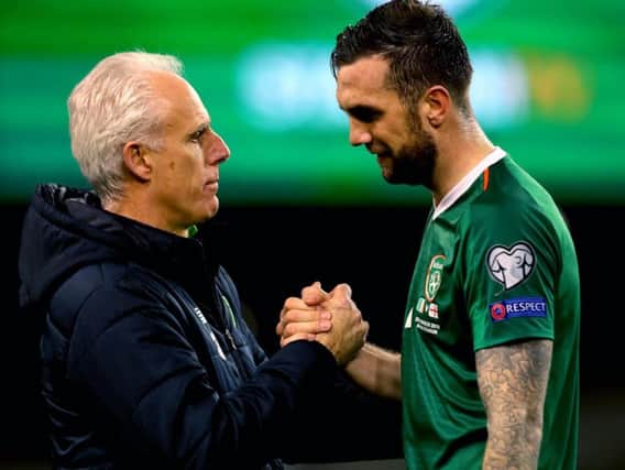 Republic of Ireland manager Mick McCarthy with Shane Duffy after the Georgia game.