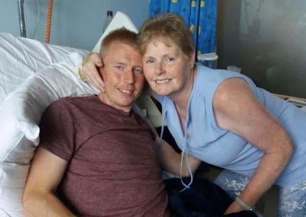 Dale Hutchison and his mother, Audrey, pictured in hospital a few days post-transplant.