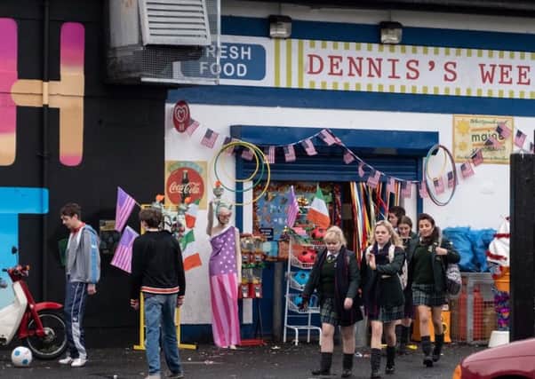 Derry Girls outside Dennis' wee shop (Photo by Peter Marley)