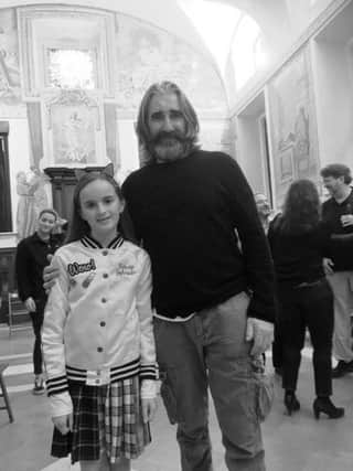 Foyle Speech and Drama and Ebrington P.S. student Alemia Doherty with renowned Irish actor John Lynch in Rome.
