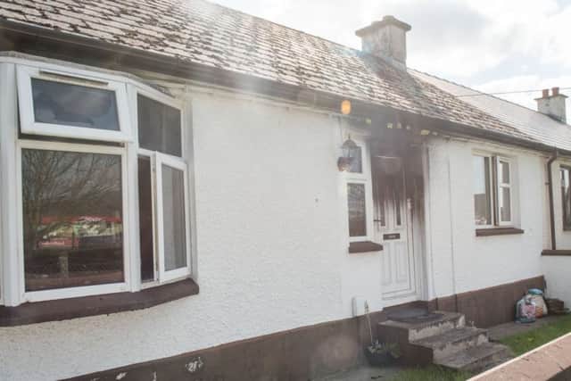A woman in her 60s has been treated for shock after an arson attack in Derry last night