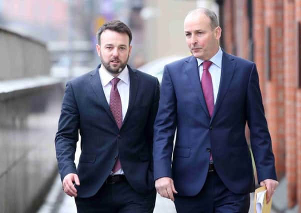 SDLP leader Colm Eastwood MLA and Fianna Fail leader Micheal Martin TD.