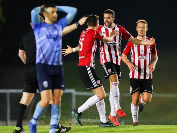 Derry City's Darren Cole celebrates scoring against UCD.