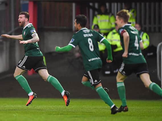 Derry City's Patrick McClean runs away celebrating after scoring the opening goal against St Patrick's Athletic.