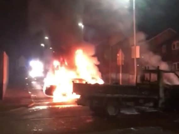 An image from the riot, close to where the woman was shot dead.