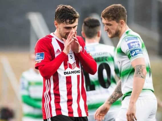 Eoghan Stokes reacts after coming close with a shot from distance.
