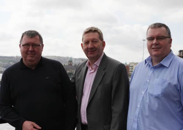 Liam Gallagher, left, and Gareth Scott, right, with Unite General Secretary Len McCluskey during a vist to the city.