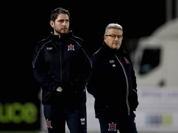 Dundalk assistant manager, Ruaidhri Higgins, pictured with first team coach, John Gill, expects a tough test from Derry City at Oriel Park.