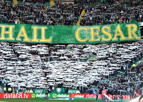Fans hold up banners in memory of the late Billy McNeill before the Ladbrokes Scottish Premiership match at Celtic Park