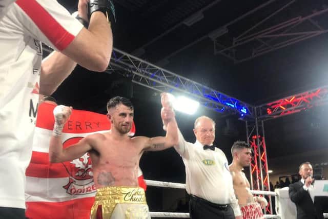 Tyrone McCullagh has his hand raised in victory in Newcastle.