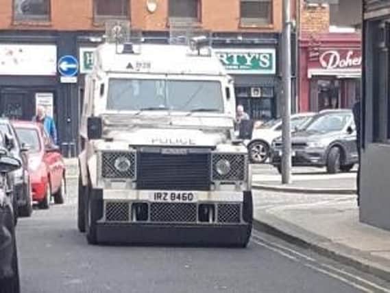 A PSNI landrover in Chamberlain Street while a search was conducted of Junior McDaid House.