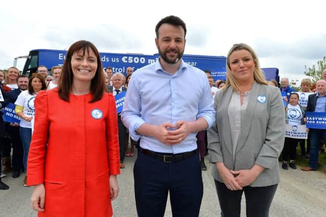 SDLP Euro candidate, Colum Eastwood, with his wife Rachel, right, and Nichola Mallon, deputy leader, and party members at his campaign launch.