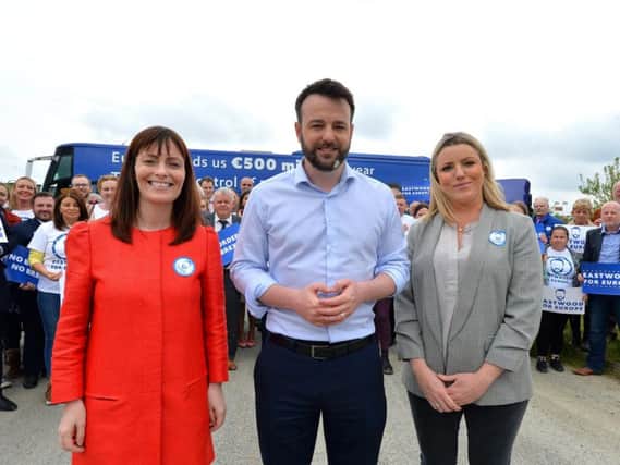 SDLP Euro candidate, Colum Eastwood, with his wife Rachel, right, and Nichola Mallon, deputy leader, and party members at his campaign launch.