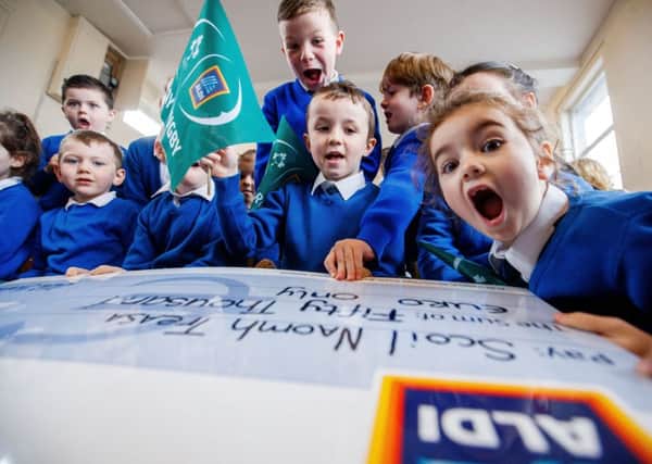 Aldi and the IRFU announced the two winners of the hugely successful sticker competition for primary schools, which ran from January until April this year, with each school winning 50,000 euro for their playing facilities!  Pictured are pupils from Scoil Treasa, Tiernasligo. ©INPHO/Tommy Dickson