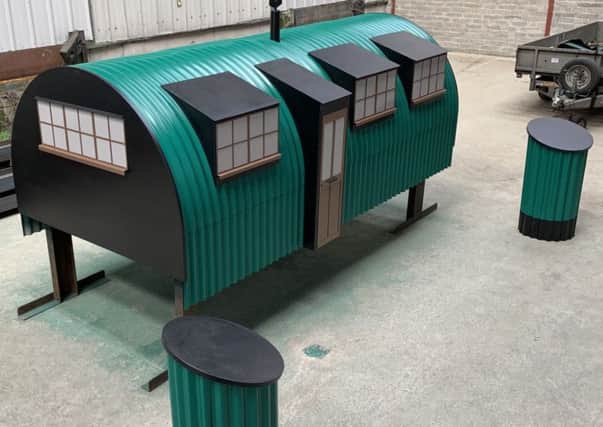The new Springtown Camp art installation features a replica of the nissan huts.