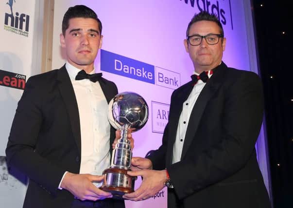 Danske Bank's Chris Marshall presents Jimmy Callacher with the Player of the Year Award.