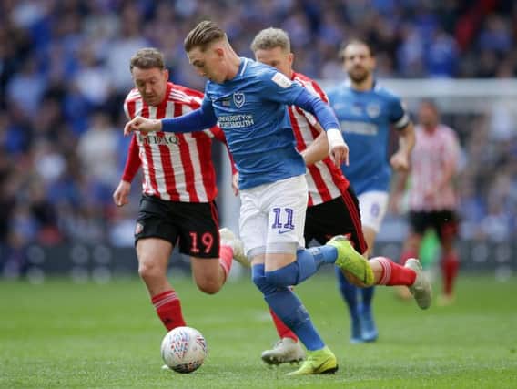 It's been a long year for Portsmouth striker, Ronan Curtis, pictured playing against Sunderland's Aiden McGeady in the Checkatrade Trophy Final.