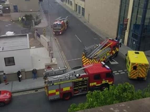 Fire and ambulance crews attending the incident in Derry this morning. Photograph by Jodie McGlinchey