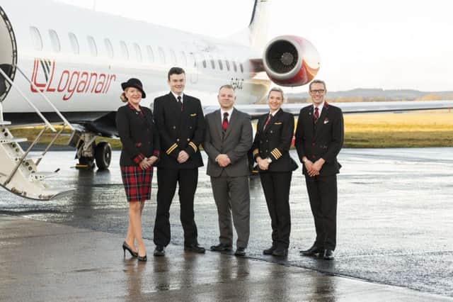 Ready for take off....  Loganair Managing Director Jonathan Hinkles with pilots and cabin crew at City of Derry Airport.