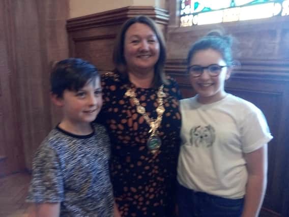 The new Mayor. Councillor, Michaela Boyle, with her proud grandchildren, Cormac and Blithn, after receiving the chains of office in the Guildhall tonight.