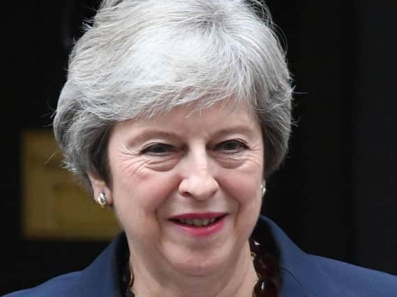 Theresa May.