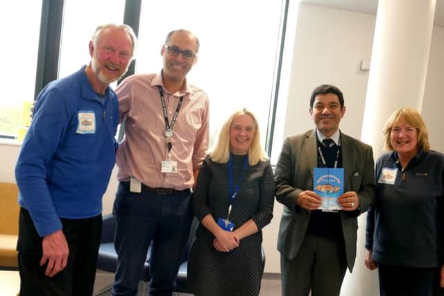Brian Burnie with Oncologists at the North West Cancer Centre in Derry before beginning his trek around Ireland.