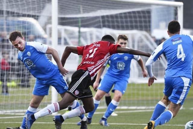 Derry City forward Junior Ogedi-Uzokwe battles to find a way through a packed Finn Harps defence. DER2219-109KM