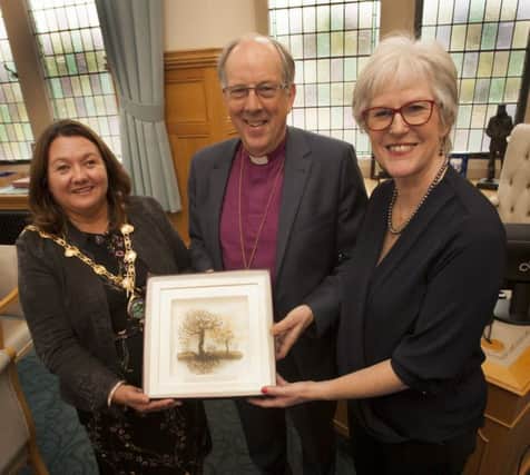 The Mayor of Derry City and Strabane District Council, Michaela Boyle making a special presentation to Very Rev. Dr. Ken Good, Bishop of Derry and Raphoe at the Guildhall on Saturday evening, to mark the occasion of his retirement at the end of this month. On right is Mrs. Mary Good. (Photo: Jim McCafferty Photography)