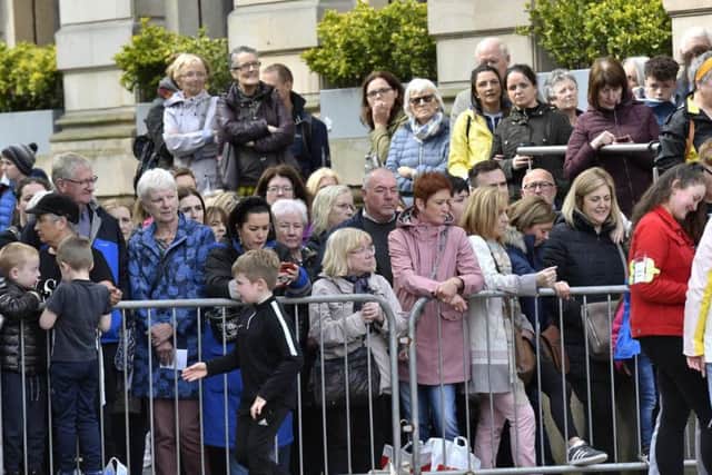 Well-wishers turn out to greet the arrival of 'Lyra's Walk' to Derry.