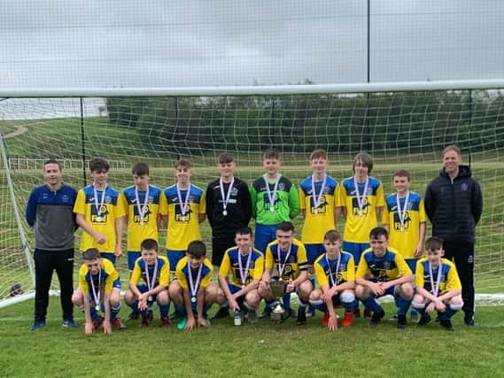 St Columb's College U14s pictured with coaches, Ryan Horner and James Green after winning the Five Nations Championships.