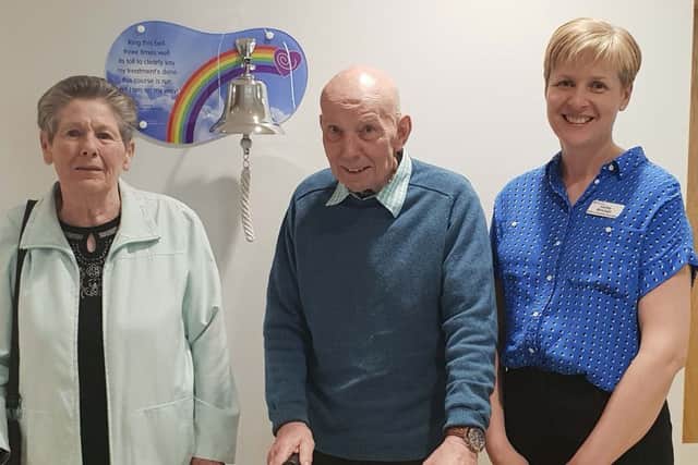 From Left  Mr John Doran and Margaret Doran from Derry, whose Granddaughter and Niece donated the bell. Also in the picture is Lesley Mitchell Macmillan Lead Nurse, Cancer Services.