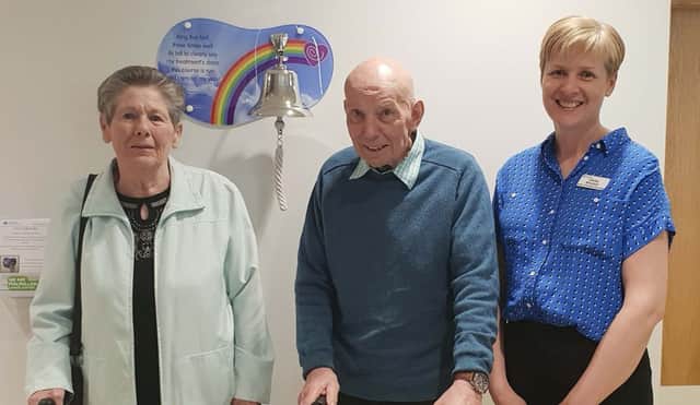 From Left  Mr John Doran and Margaret Doran from Derry, whose Granddaughter and Niece donated the bell. Also in the picture is Lesley Mitchell Macmillan Lead Nurse, Cancer Services.