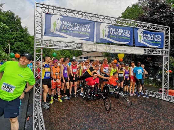 Almost 1,000 runners get ready for the 2019 Walled City Marathon