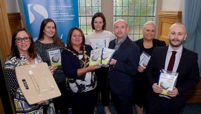 Mayor of Derry City and Strabane District, Councillor Michaela Boyle, pictured with Eamonn Toner, Environmental Health Team Leader, Derry City & Strabane District Council at the launch of Councils Blind Cord Safety Campaign. Included from left, are Olivia Lagan, Health and Community Wellbeing Team, Colleen Mulrine, Environmental Health Officer, Ailish Daly, Environmental Health Officer, Michelle Duddy, Registrar, and Emlyn Lynchehaun, Environmental Health Officer. (Photo - Tom Heaney, nwpresspics)
