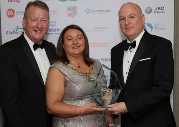 Mayor Michaela Boyle presents the NW Overall Business/Entrepreneur of the Year award to John Harkin, Alchemy Technology Services at the 2019 NW Business Awards held in the White Horse Hotel. Included on left is Jim Roddy, chief executive, CCI. (Photo - Tom Heaney, nwpresspics)