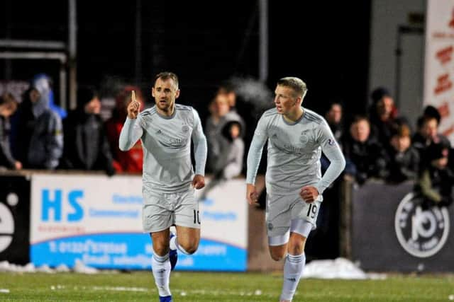 Niall McGinn celebrates scoring for Aberdeen earlier this year.