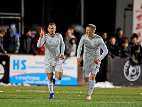 Niall McGinn celebrates scoring for Aberdeen earlier this year.