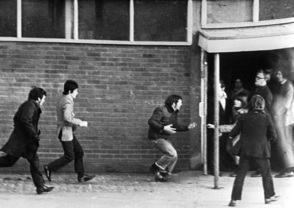 People running for cover on Bloody Sunday (PA/PA Wire)