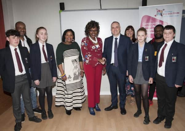 NOW LETâ¬"S TALK . . . . .Mr. Michael Allen, Principal, Lisneal College welcoming Lilian Seenoi-Barr, Programme Director, North West Migrants Forum to the school on Monday morning. Lisneal is the first of a number of local schools to take part in the â¬ÜNow Letâ¬"s Talkâ¬" Cultural Diversity programme which is funded by DCSDC and Peave IV. Included from left are Lawson McKeown, Joseph Akinyemi, Mollie Barnett, Nandi Jola, Lauren Nash, Sally Neely, Cuthy Daimond and Jamie Sheriffs. (Photos: Jim McCafferty Photography)