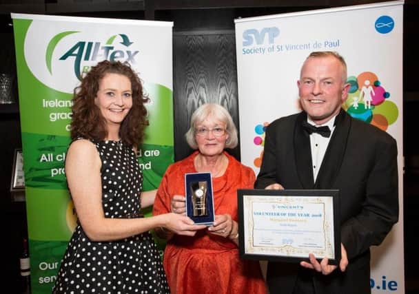Pictured at the 2019 SVP National Shops Awards ceremony in the University of Limerick is Margaret Sweeney, SVP Derry, receiving the award from Area Manager for SVP in Northern Ireland, Anne Crossan, and SVP National Retail Development Manager, Dermot McGilloway.