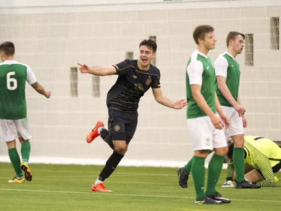 Highly rated defender, Josh Kerr pictured celebrating a goal for Celtic U20s against Hibs during his four year stint at Parkhead.