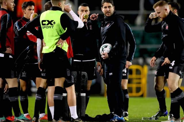 Dundalk assistant manager Ruaidhri Higgins talks to the players before their game at Shamrock Rovers.