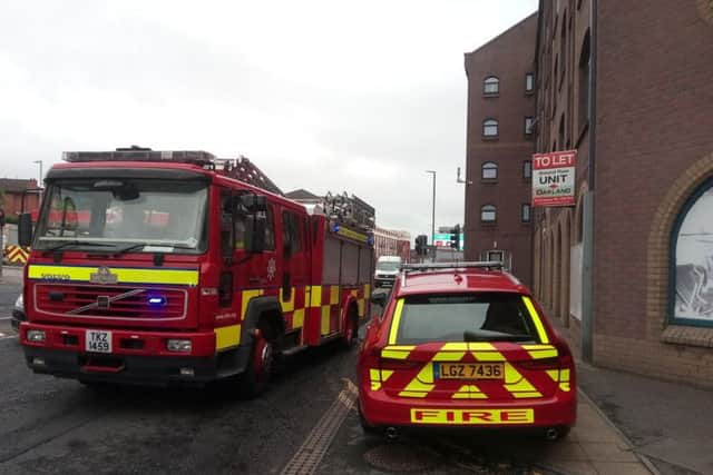 Fire service vehicles outside Rockmills.