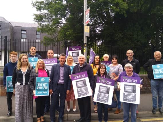 Sinn Fein and SDLP representatives protesting with Unite trade union and Pensioners' Parliament representatives outside Radio Foyle last week.